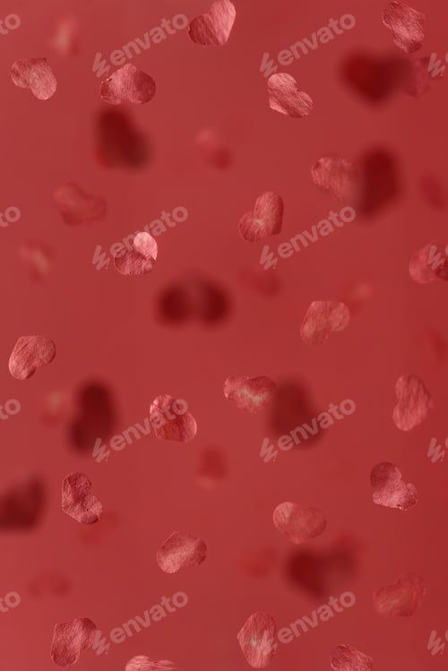 Preview: Falling hearts. Paper hearts flying in on a pink background.