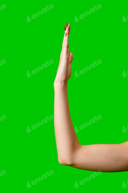 Preview: Womans Arm Hand Sign Raised in the Air