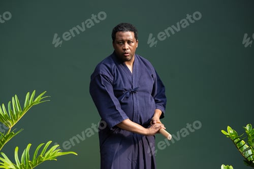 Preview: Handsome black martial artist man with martial arts costume of kendo