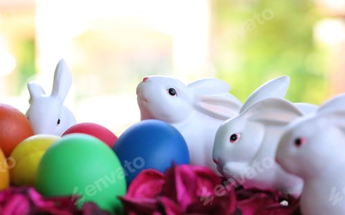 Preview: Easter eggs and white bunny blur background
