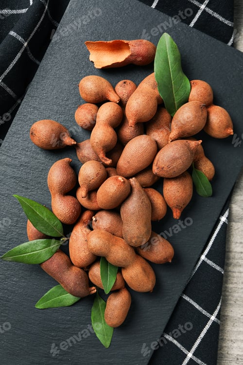 Preview: Tamarind fruit, concept of delicious food, fresh tamarind