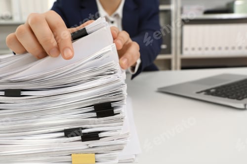 Preview: Woman working with documents at table in office, closeup. Space for text