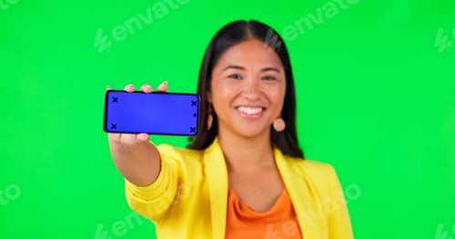 Preview: Green screen, phone screen and woman face with thumbs up for yes, vote or social media review on st
