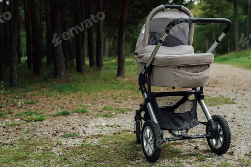 Preview: Baby stroller in forest