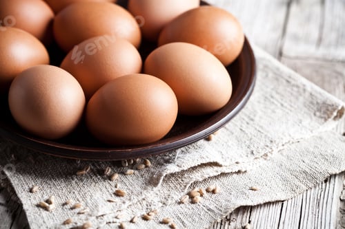 Preview: fresh brown eggs in a bowl
