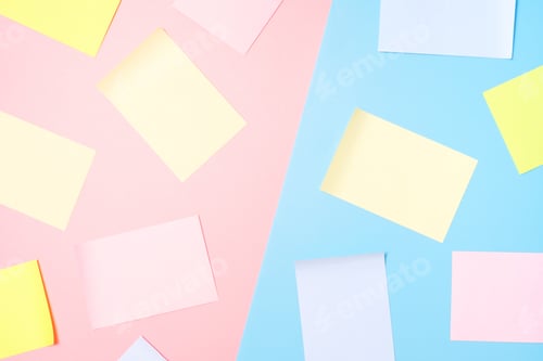 Preview: Mock-up of many empty multicolored office stickers on pink and blue background.