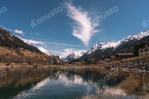 Preview: A beautiful mountain landscape with a lake in the foreground
