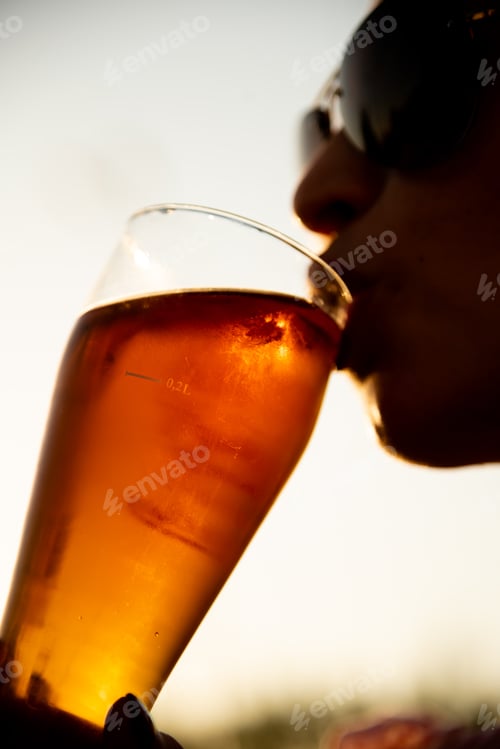 Preview: A girl with a glass of craft beer. Summer. Drinks.