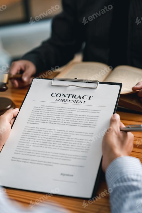 Preview: Legal counsel presents to the client a signed contract with gavel and legal law. justice and lawyer