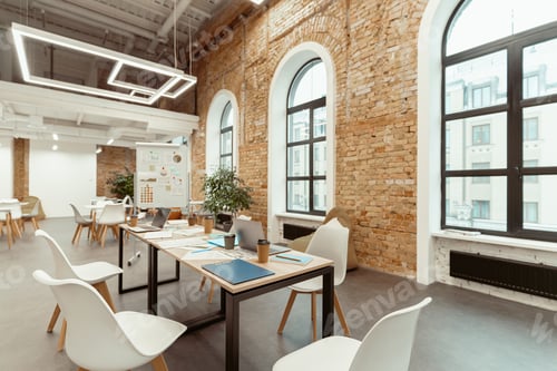 Preview: Empty work room in modern coworking in loft style