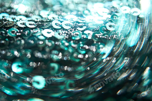 Preview: Christmas abstract background made of emerald green sequins.
