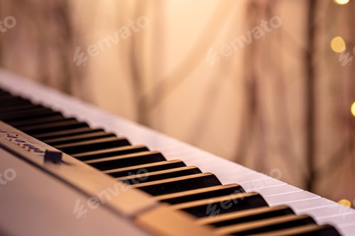 Preview: Piano keys on a beautiful colored background.
