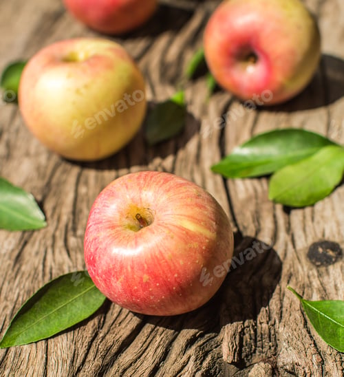 Preview: Apples on a wooden board
