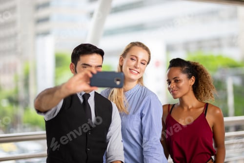 Preview: Group of successful colleagues and business people outdoor