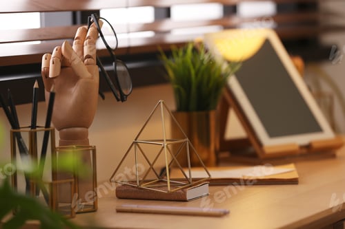 Preview: Stylish workplace with different accessories on table at window. Ideas for interior design