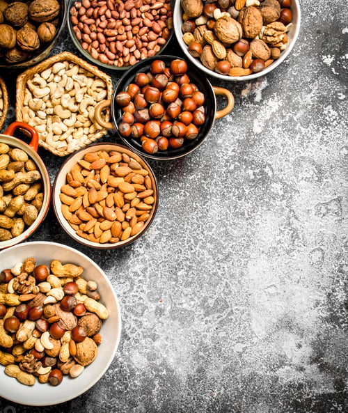 Preview: A lot of nuts in different bowls.