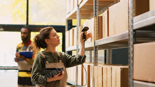 Preview: Depot worker scanning packages on racks