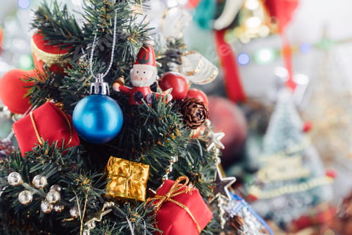 Preview: Christmas background with decorations and gift boxes on wooden