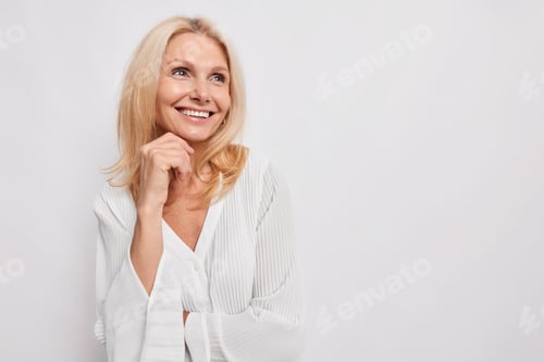 Preview: Smiling Woman in White Shirt Leaning on Hand