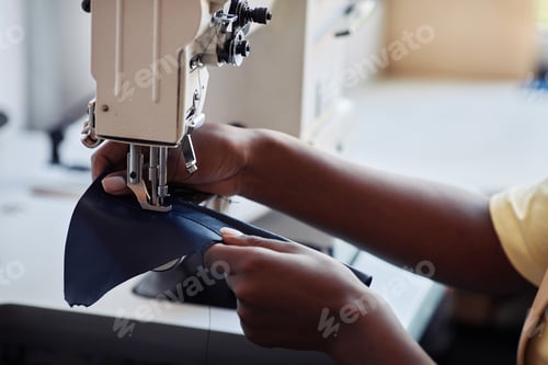 Preview: Woman Sewing Leather Bag