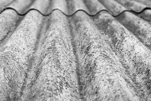 Preview: The Abstract Textured Background A Closeup Of Old Wavy Asbestos-Cement Slate Of Monochrome Tone