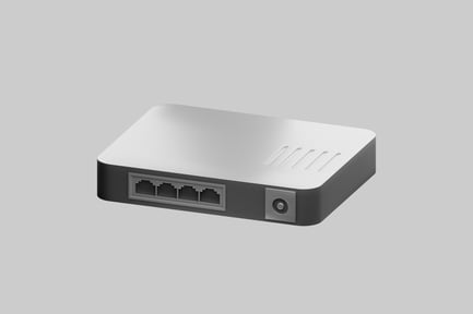 Preview: Rectangular device with four small holes and a circular button