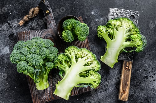 Preview: Sliced organic Raw green broccoli cabbage. Black background. Top view
