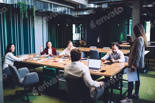 Preview: Merry business team during seminar