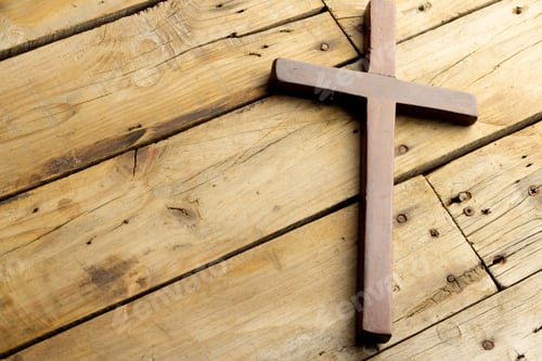Preview: Image of close up of cross and copy space on wooden background