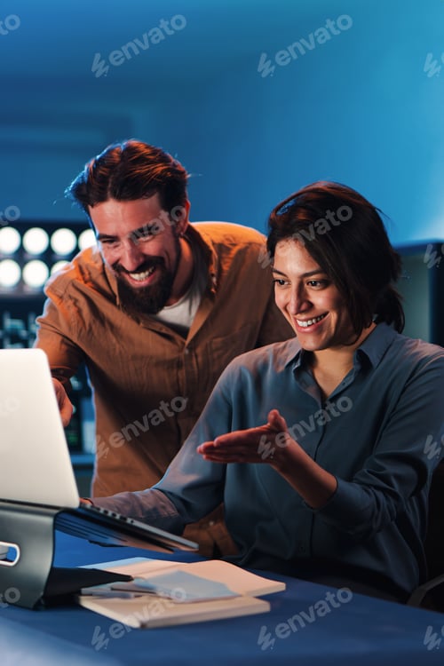 Preview: Vertical portrait of business people working on trading finance with a laptop computer in the office
