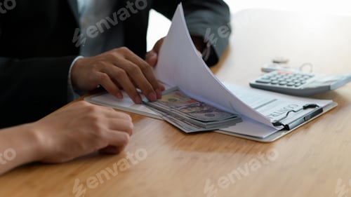 Preview: Businessman hiding money in documents to bribe government officials, corruption concept.