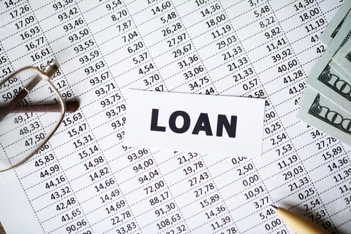 Preview: Loan Document with Calculator, Pen, and Money