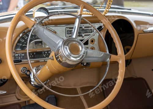 Preview: Closeup shot of the interior of a car including the steering wheel