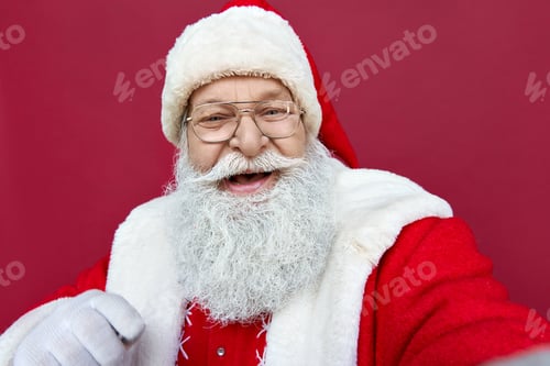 Preview: Happy Santa Claus taking selfie, video calling, recording video, camera view.