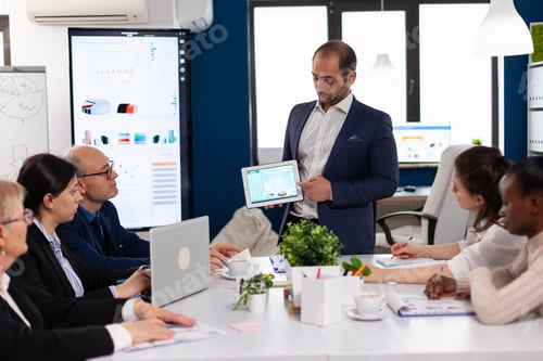 Preview: Succesful business man presenting the good evolution of company