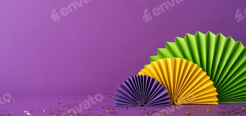 Preview: Vibrant side view display of green, yellow, and purple paper fans atop