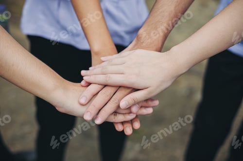 Preview: Hands together of teamwork