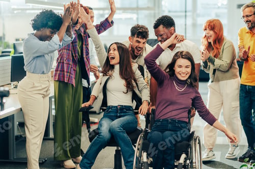 Preview: Laughing female racing woman with disability in an office chair race
