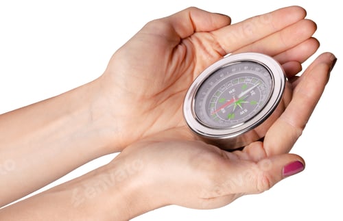 Preview: Compass in hand isolated on white background