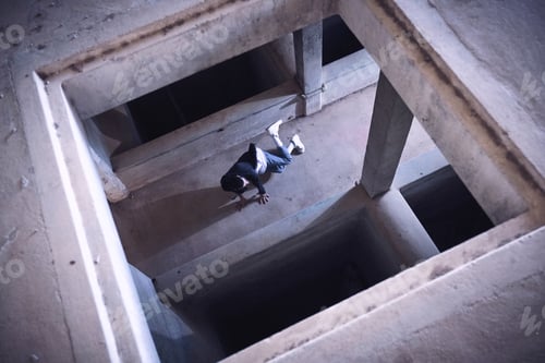 Preview: Anonymous man dancing in shabby building