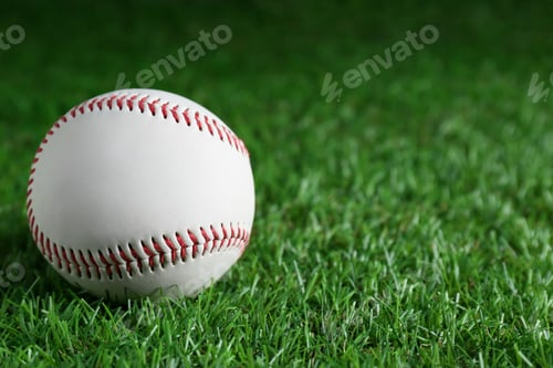 Preview: Baseball ball on green grass, closeup with space for text. Sports game