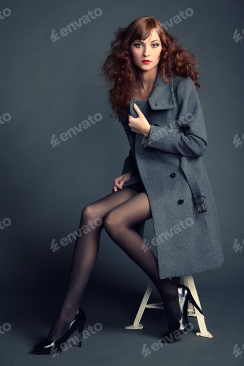 Preview: Portrait of young woman in autumn coat