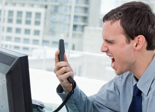 Preview: Angry Office Worker On The Phone In His Office
