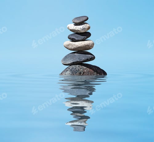 Preview: Zen balanced stones stack in lake balance peace silence concept