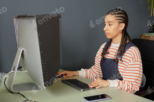Preview: Woman using Computer Editing Video Or Pictures