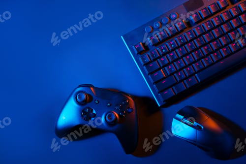 Preview: Gaming concept on black background with computer keyboard and joystick