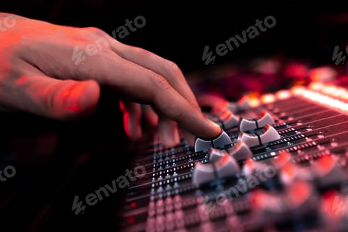 Preview: close up the recording room dark with neon lighting in the studio the sound engineer works with the