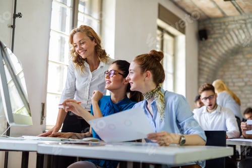 Preview: Portrait of business women working together in corporate office. Finance architect startup concept