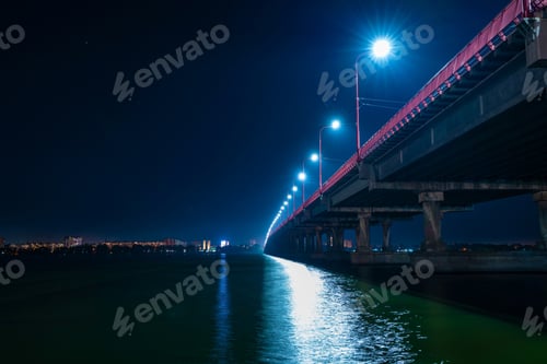 Preview: Bottom view of a beautiful bright long bridge over the big beautiful Dnieper river