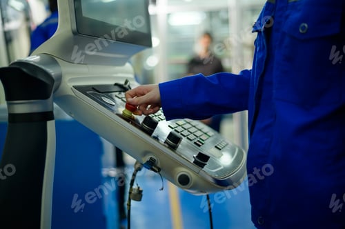 Preview: Robotics engineers Using Controller to Remotely Operate programming and Manipulating Robot Hand